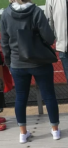 Stocky Girl in Tight Blue Jeans at a Stadium Creepshots Gallery