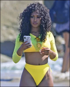 2 amazing candid black girls at the beach in thong bikinis with perfect asses