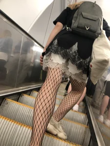 Cute Girl in Lacey Semi-Transparent Dress and Fishnet Pantyhose Subway Escalator Candid Photos Gallery