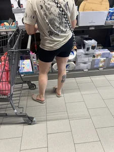 Milf in black biker shorts and flip flops
