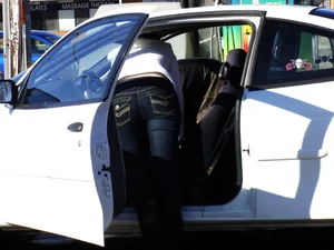 Some candid girls cleaning their cars in jeans and some showing ass crack