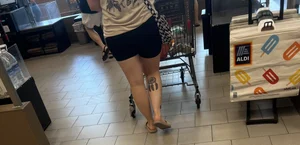 Milf in black biker shorts and flip flops