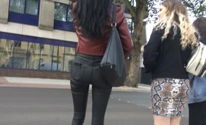 Chav brunette with a nice ass and vpl in tight black leather pants
