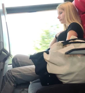Hot busty blonde on train