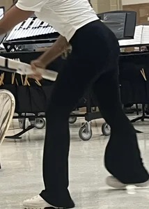 Hot ass of a chick in tight pants at the music class