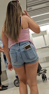 Shorty gorgeous Latina MILF in Jean short shorts.