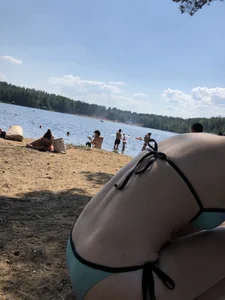 Group of Girls in Swimsuits at a Lake Beach