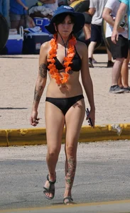Girls in bikinis getting ready for tubing