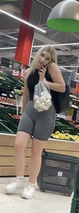 Beauty blonde in tight shorts with juicy fat ass