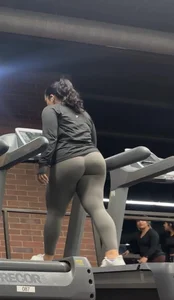 Sexy Latina with thick thighs in gray tight leggings on the treadmill