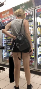 Blonde In Shorts Bending Over