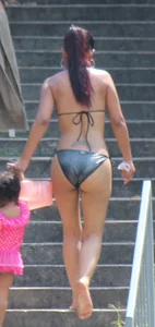 Sexy brunette milf in a bikini with a great body, nice ass and some camel toe