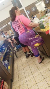 Fat booty milf in purple leggings at the grocery store