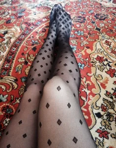 Legs in Black Pantyhose with Dots - Girl Sitting on the Floor Selfie Closeup