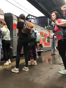 Teen Girl in Tights And Sneakers Standing on the Train Platform VPL Photos