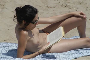 Girls on a nude beach in Sitges, Spain