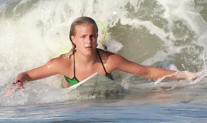 Hot surfer chicks out in the water