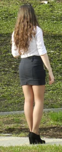 Group of Hot Girls in Blouses, Skirts and High-Heeled Shoes Photographing Each Other In a Park Creepshots