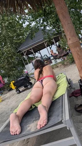 Bikini flower Bend over on the beach. OC