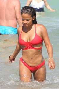 Christina Milian in red bikini in Miami with hard nipples