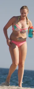 Thick blonde bikini babe on the beach