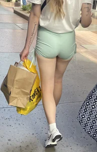 Sexy blonde in green shorts