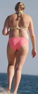 Thick blonde bikini babe on the beach