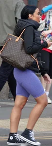 Wide hipped, juicy fronted tanned brunette pawg struts in lycra shorts