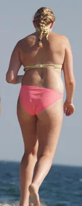 Thick blonde bikini babe on the beach