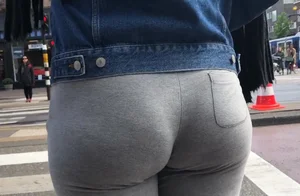 Candid girl with an amazing ass with her tight sweats and thong being eaten by her booty