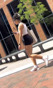 Curly Campus Brunette with amazing Bubble Butt in Tight Shorts (oc)