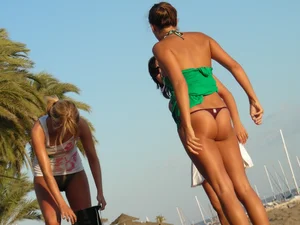 Sexy ass girl topless on the beach with a nice ass in a thong bikini