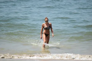 Redhead with nice tits in a bikini on the beach