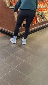 Tight legs and ass in black legging. Bend over