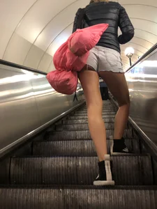 Hot Milf in Mini Shorts on the Subway Escalator and in the Train Candid Gallery
