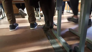College Teen's Legs in Dark Pantyhose And Feet in Flats Classroom Under Desk Creepshots