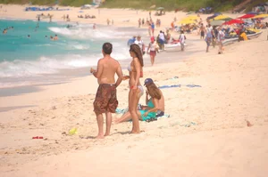 Bunch of sexy girls and milfs in bikinis at the beach