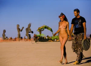 Only one is nude - group photos where only 1 girl is naked, and the rest of the people are dressed