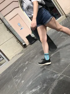 Hot chunky skater girl wearing denim shorts