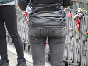 Cute petite girl in tight black jeans