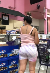 Thick Latina babe with a nice ass in tight patterned shorts