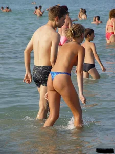 Beach voyeur girls in bikinis, thongs and topless