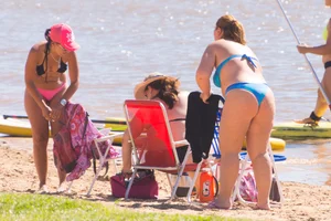 Candid beach girls in thongs