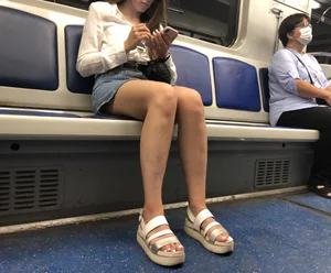 Sexy Chick in a Blouse, Jean Skirt And Sandals Subway Station And Train Creepshots - Great Legs