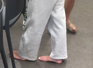 Bare Feet Closeups at a Desk Creepshots Gallery