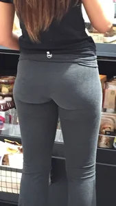 Hot chick getting coffee in tight grey leggings with a nice ass