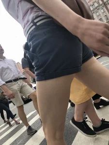 Young Girl in Shorts And Sandals Crossing the Street Gallery