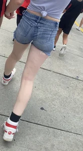 Tight ass in grey jean shorts.