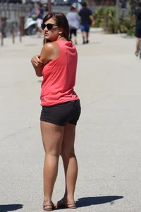 Thick girl in pink top and black shorts with vpl