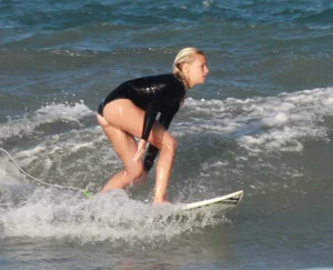 Hot surfer chicks out in the water